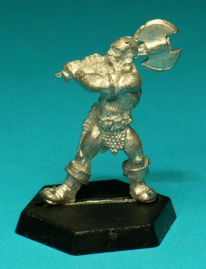 Pose 2, variant A. This figure is armed with a double-bladed, two-handed battleaxe, and he wears leather boots and a chainmail groin-guard. At his belt he carries a handaxe and a small pouch and a sheathed dagger. This variant has a shaven head and a short beard with a long moustache. His mouth is open in a shout.