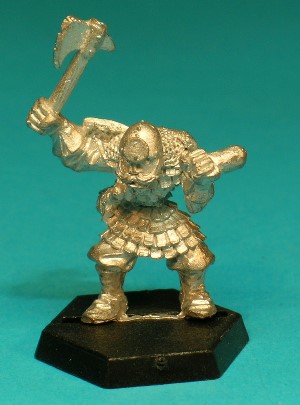 Pose 1, variant F. This variant wields a hand-axe with a single, notched blade. He wears a plain round helmet with small rivets and cheekguards and a plain disc symbol on the front. His head looks forwards, with aclosed mouth and a large 'handlebar' moustache.