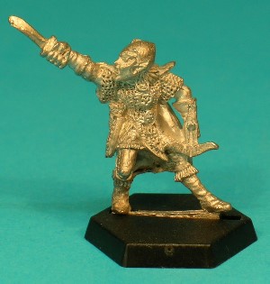 Pose 2, variant E. This figure holds a short-bladed dagger upwards and out to his right. He wears a conical helm with long cheek-guards and a skull emblem on the front. He looks forwards and his mouth is closed.
